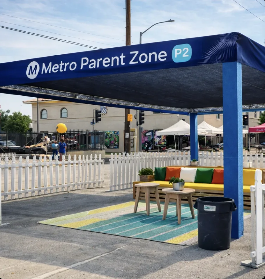 Metro Parent Zone branded lounge with sectional seating and striped rug